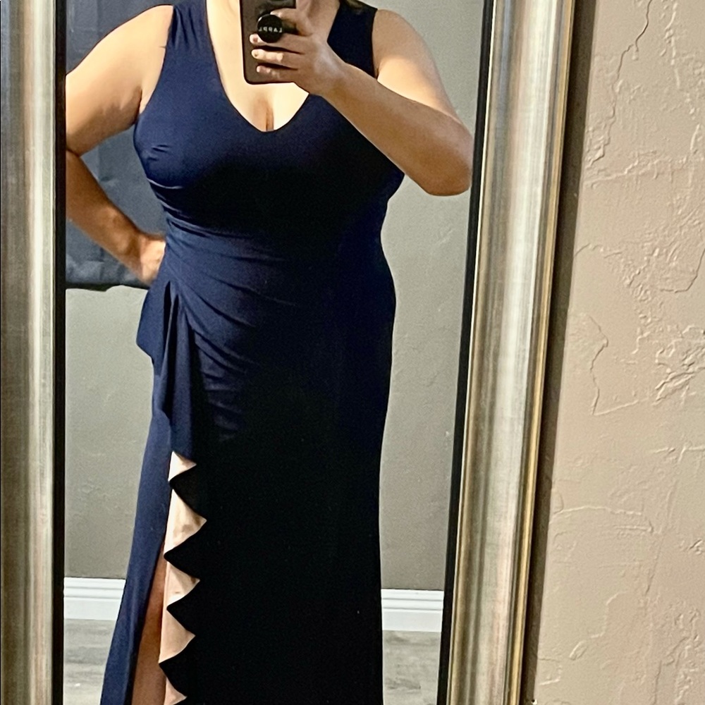 Long navy sleeveless scrunch gown with champagne folds
